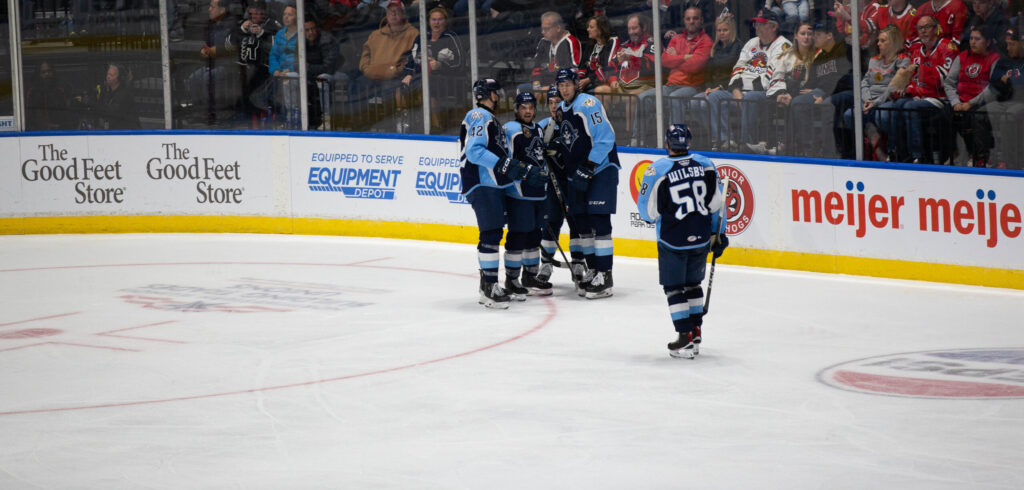 Ads Storm Back to Tame IceHogs